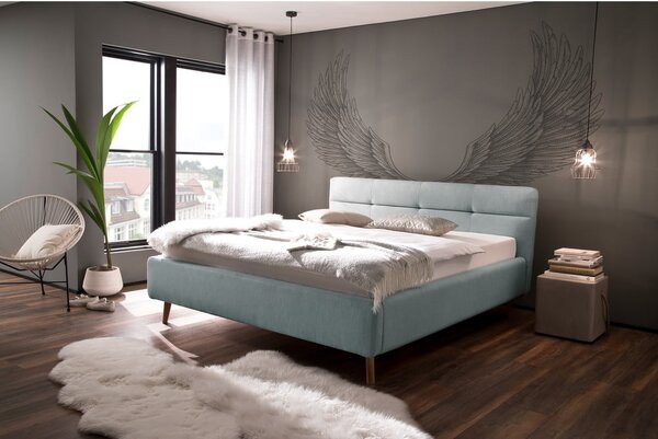 Svetlomodrá čalúnená dvojlôžková posteľ s úložným priestorom s roštom 160x200 cm Lotte – Meise Möbel