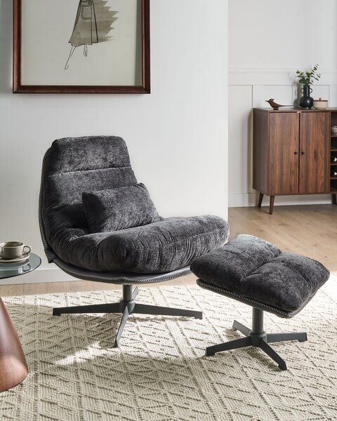 Kreslo s podnožkou čierne ženilkové čalúnenie otočný podstavec prešívané sedadlo moderný mid century štýl obývačka spálňa