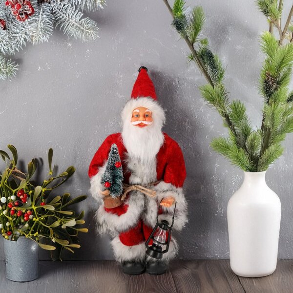 Vianočná dekorácia Santa Claus so sánkami a lyžami 30 cm