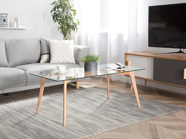 Konferenčný stolík priehľadný svetlé drevo sklenená vrchná doska drevené nohy 120 x 60 cm obdĺžnikový tvar škandinávsky štýl obývačka