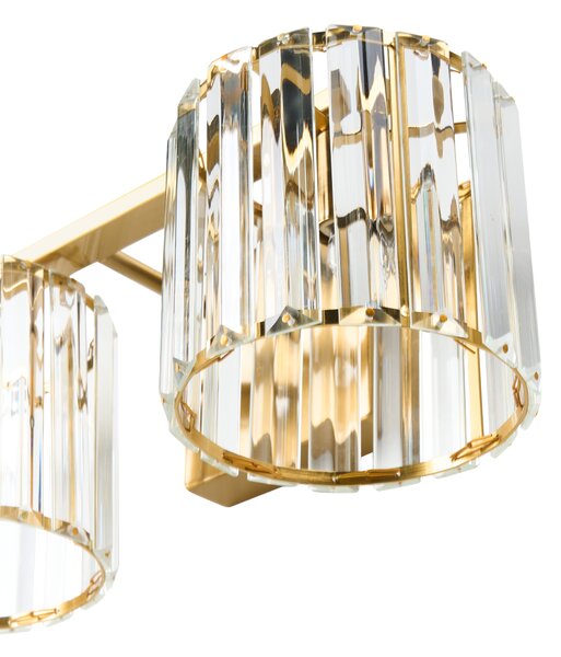 Nástenná lampa zlatá kovová priehľadné sklenené tienidlo geometrický tvar moderný štýl