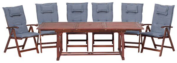 Záhradná sada rozložiteľný stôl a 6 skladacích stoličiek s modrými vankúšmi akáciové drevo