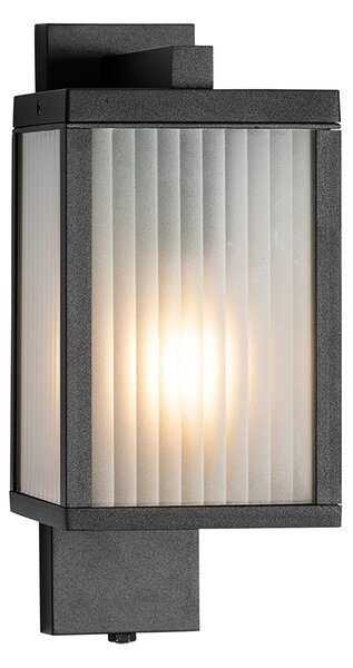 Vonkajšia nástenná lampa čierna s rebrovaným sklom a senzorom súmraku - Charlois
