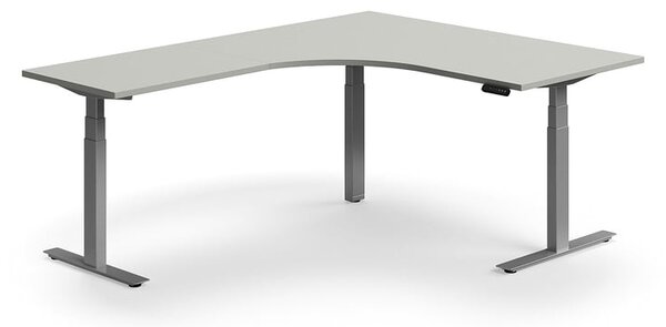 Výškovo nastaviteľný stôl QBUS, rohový, 1600x2000 mm, strieborný rám, svetlošedá