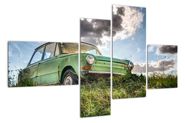 Obraz zeleného auta v tráve (Obraz 110x70cm)