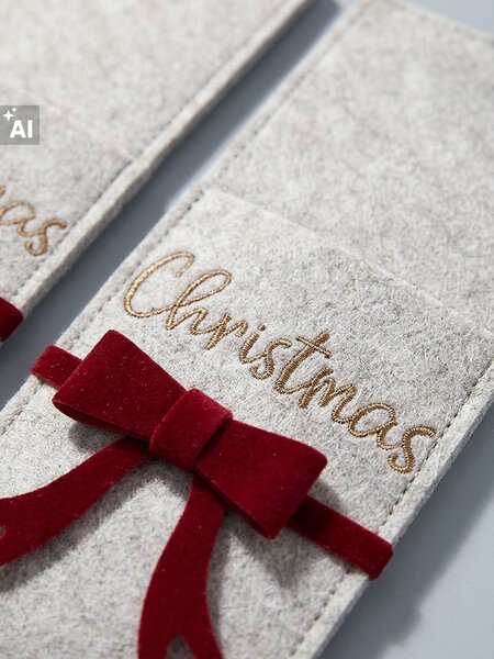 Sinsay - Vianočné puzdro na príbor s mašľou a nápisom Christmas - béžová