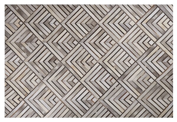 Koberec z hovädzej kože béžový 140 x 200 cm kožený patchworkový geometrický vzor