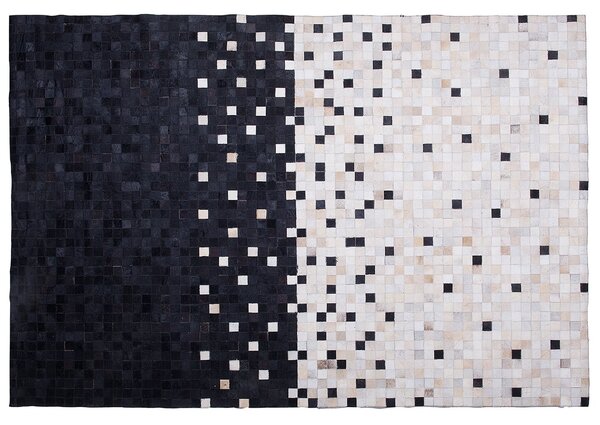 Kožený koberec čierny a béžový 140 x 200 cm pravá hovädzia koža patchworkový moderný vzorovaný