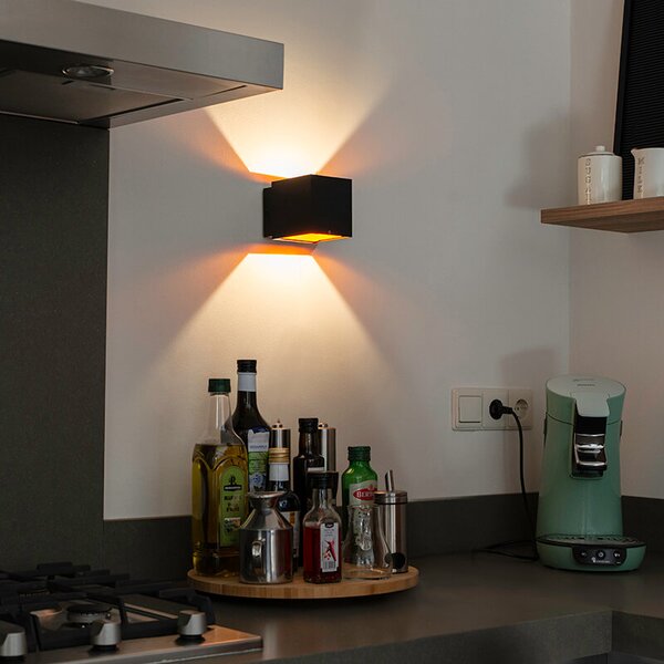Dizajnová nástenná lampa čierna/zlatá vrátane LED - Caja