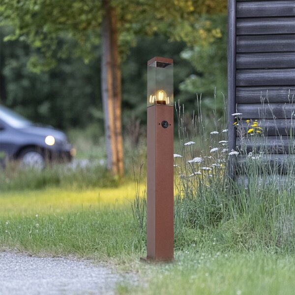 Vonkajšia lampa hrdzavo hnedá s čírym sklom 80 cm IP44 so zásuvkou a snímačom pohybu - Malios
