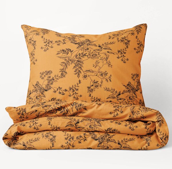 Goldea bavlnené posteľné obliečky - vzor 932 čierne kvety na tmavo oranžovom 140 x 220 a 70 x 90 cm