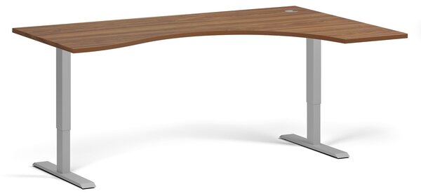 Ergonomický výškovo nastaviteľný stôl, 180x120 cm, 1 motor, L/P, sivá podnož, orech