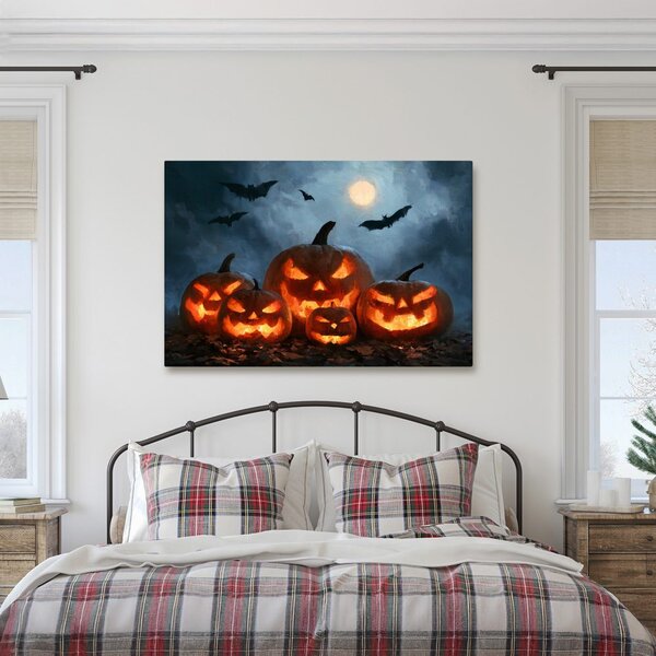 Obraz halloweenske tekvice pod netopiermi