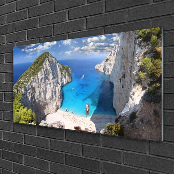Obraz na skle Záliv hora pláž krajina 100x50 cm 2 Prívesky