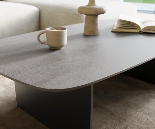 DELIFE Konferenčný stolík Edge zaoblený tvar 120×70 cm keramika betónová sivá Salto kov čierna