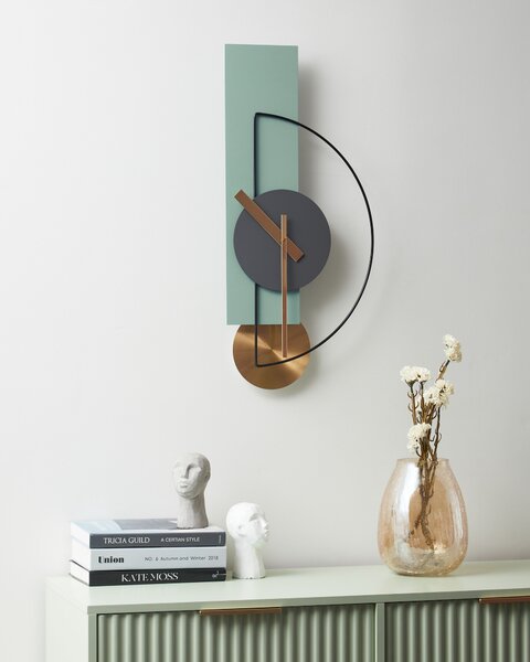 Nástenné hodiny svetlozelené oceľové kovové 31 x 63 cm moderný minimalistický dizajn bez číslic doplnky do obývacej izby