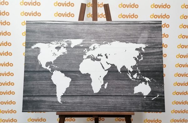Obraz na korku čiernobiela mapa sveta s dreveným pozadím