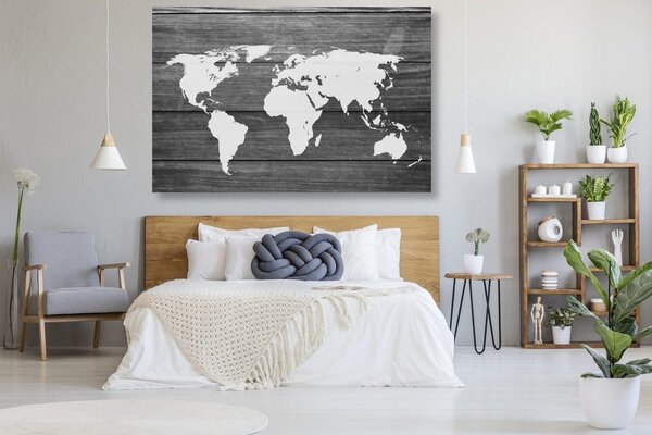 Obraz na korku čiernobiela mapa sveta s dreveným pozadím