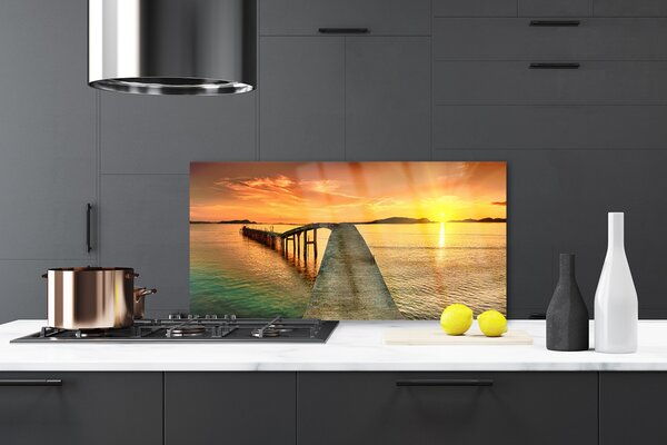 Sklenený obklad Do kuchyne More slnko most krajina 120x60 cm