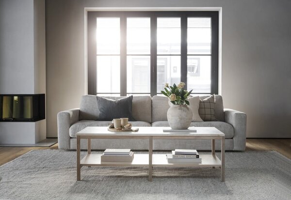 Hnedo-béžový konferenčný stolík s doskou z kameňa 140x60 cm Orwel - Rowico