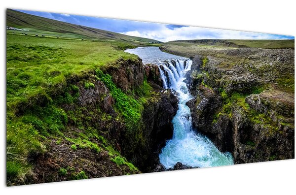 Obraz vodopádu medzi skalami (120x50 cm)