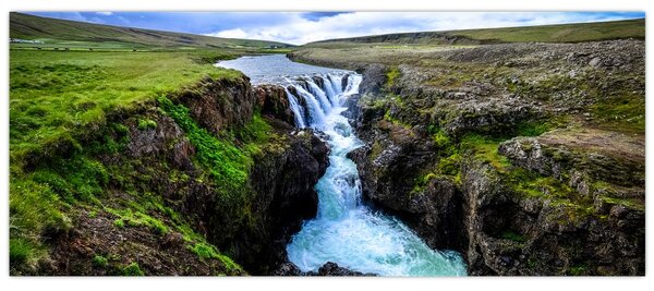 Obraz vodopádu medzi skalami (120x50 cm)