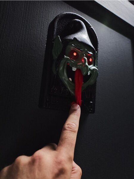 Sinsay - Halloweenska LED dekorácia - zvonček na dvere s motívom goblina - zelená