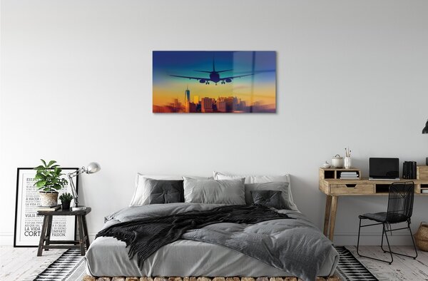 Obraz na skle Veľkomesto oblačnosti lietadlo západ 100x50 cm 2 Prívesky
