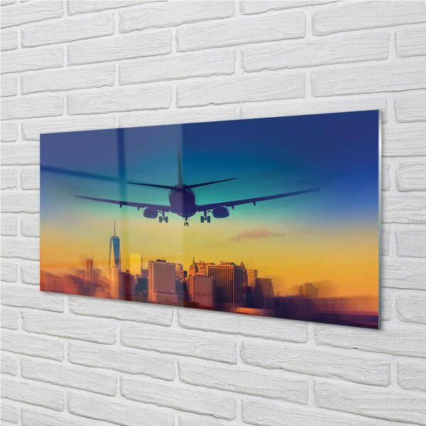 Obraz na skle Veľkomesto oblačnosti lietadlo západ 100x50 cm 2 Prívesky