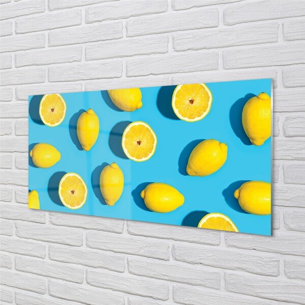 Obraz na skle Citróny na modrom pozadí 100x50 cm 2 Prívesky
