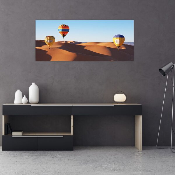 Obraz - lietajúce balóny v púšti (120x50 cm)