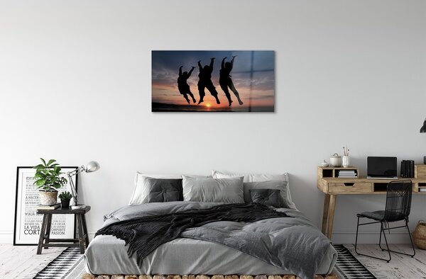 Obraz na skle Ľudia mraky západ 100x50 cm 2 Prívesky