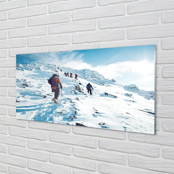 Obraz na skle Lezenie na hory v zime 100x50 cm 2 Prívesky