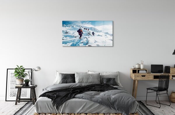 Obraz na skle Lezenie na hory v zime 100x50 cm 2 Prívesky