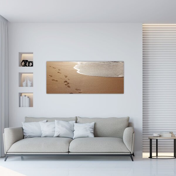 Obraz - stopy v piesku a more (120x50 cm)