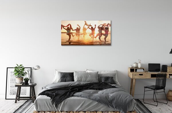 Obraz na skle Ľudia mora na západ 100x50 cm 2 Prívesky
