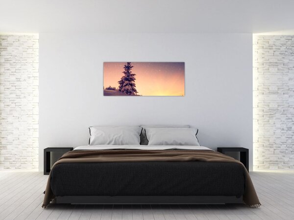 Obraz zasneženého stromu na lúke (120x50 cm)