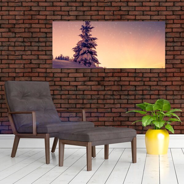 Obraz zasneženého stromu na lúke (120x50 cm)