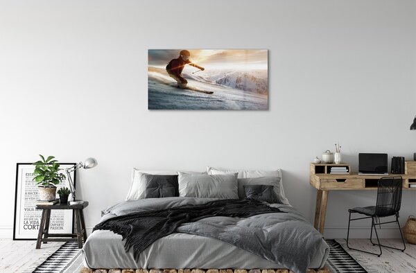 Obraz na skle lyžiarske palice muž 100x50 cm 2 Prívesky