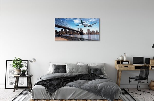 Obraz na skle Lietadiel mraky město 100x50 cm 2 Prívesky