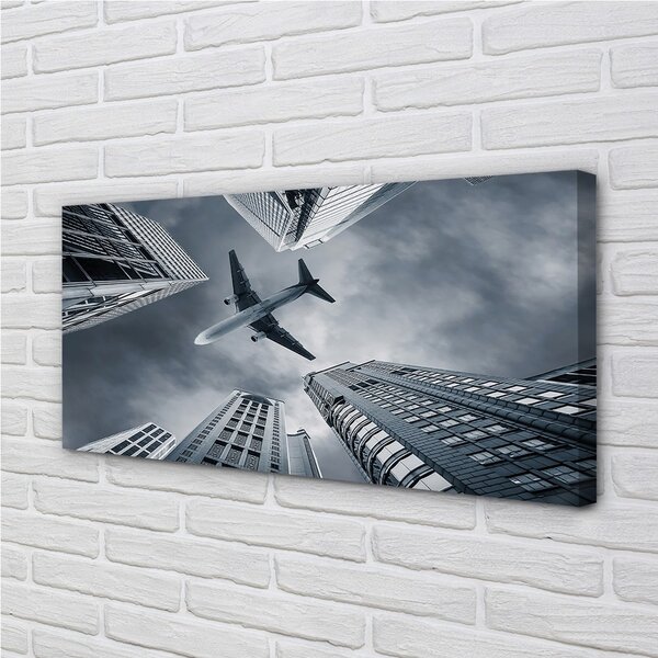 Obraz canvas Veľkomesto oblačnosti letún neba 100x50 cm
