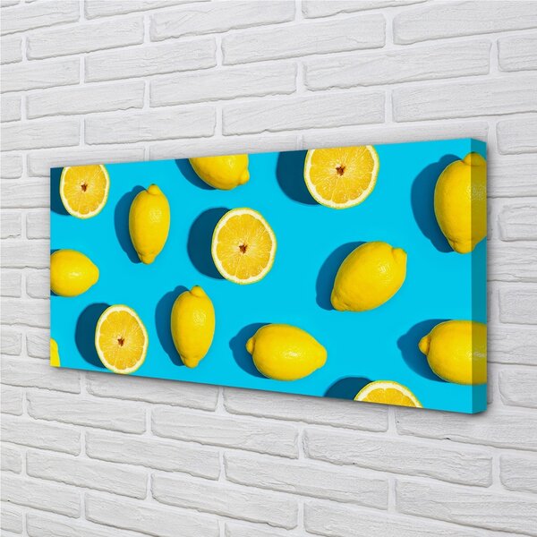 Obraz canvas Citróny na modrom pozadí 100x50 cm