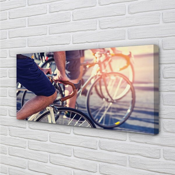 Obraz canvas cyklisti ľudí 100x50 cm