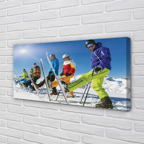 Obraz canvas Lyžiari zimné hory 100x50 cm