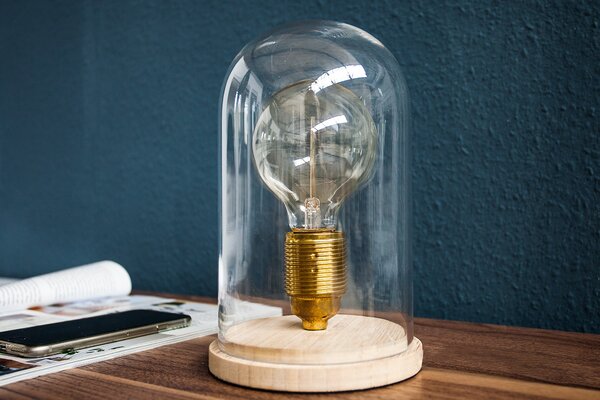Estila Dizajnová retro stolná lampa Edison s hnedou drevenou podstavou a priehľadným skleneným tienidlom 22 cm