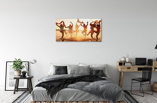 Obraz canvas Ľudia mora na západ 100x50 cm