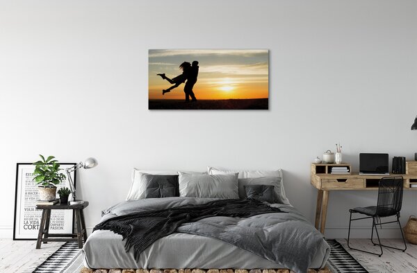 Obraz canvas Ľudia mraky západ 100x50 cm