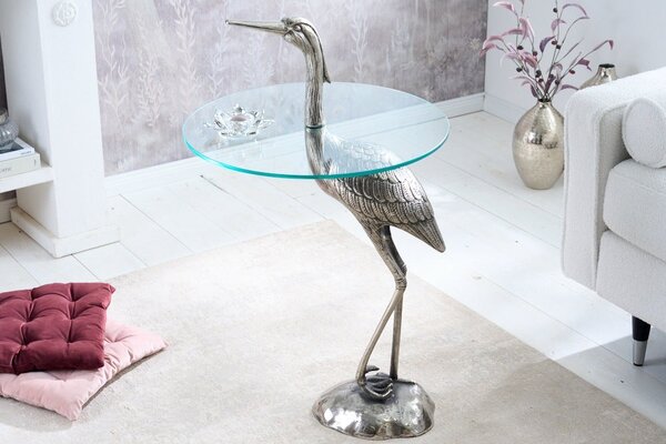 Estila Dizajnový okrúhly príručný stolík Ardea so skulpturálnou podstavou v tvare volavky v striebornej farbe 88 cm
