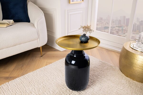 Estila Dizajnový art deco okrúhly príručný stolík Belletza s mohutnou lesklou čiernou nohou a zlatou vrchnou doskou 50 cm