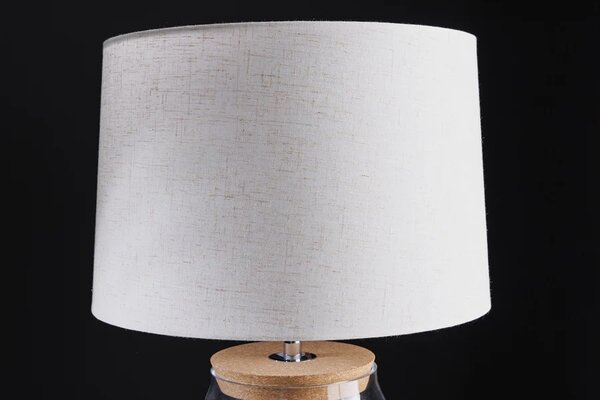 Estila Štýlová sklenená stolná lampa Clasico s nohou v podobe priesvitnej nádoby s valcovým béžovým tienidlom 60 cm